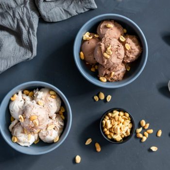 Two bowls of Chapman's Premium ice cream topped with peanuts