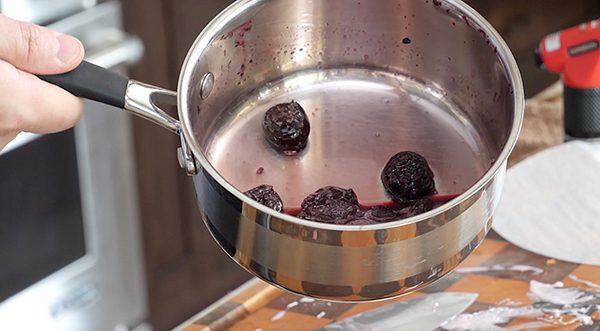 Black Cherry ice cream cake made with Chapman's Ice Cream step 6_ Add black cherries and sugar to a small pot.