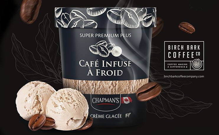 A tub of Chapman's Super Premium Plus Cold Brew Coffee ice cream with two ice cream scoops in front. Beside is the Birch Bark Coffee Co. logo.