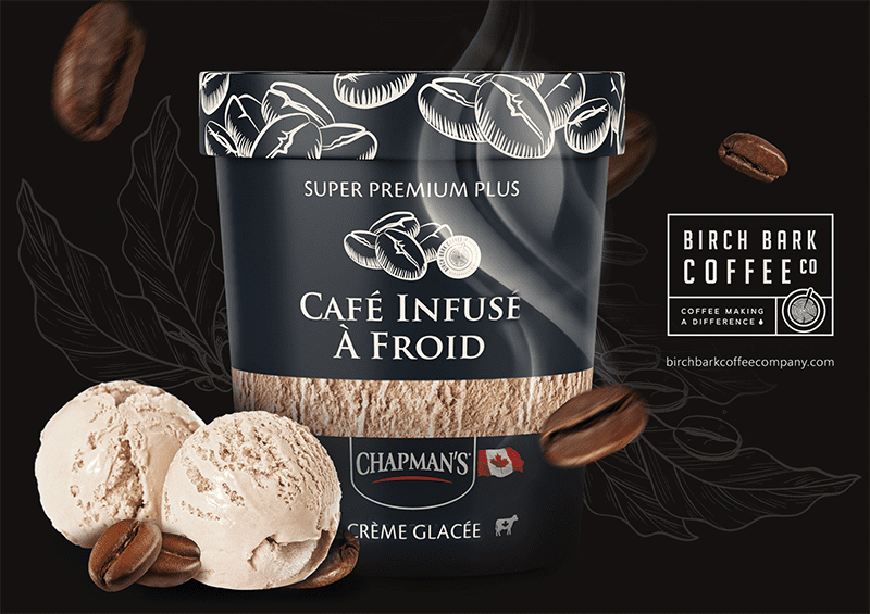 A tub of Chapman's Super Premium Plus Cold Brew Coffee ice cream with two ice cream scoops in front. Beside is the Birch Bark Coffee Co. logo.