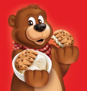 Brown Bear holding a bowl with a Chocolate Chip Ice Cream Sandwich in one hand and a Chocolate chip Ice Cream Sandwich in the other hand
