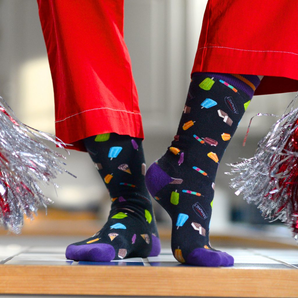 A picture of a person with red pants wearing our ice creams socks